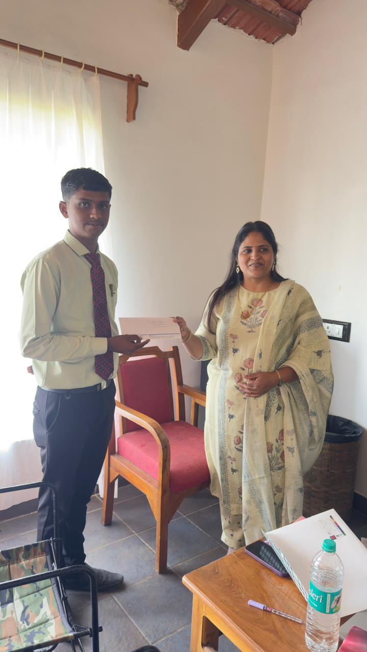 Universe Formulations team member receiving recognition from the founder